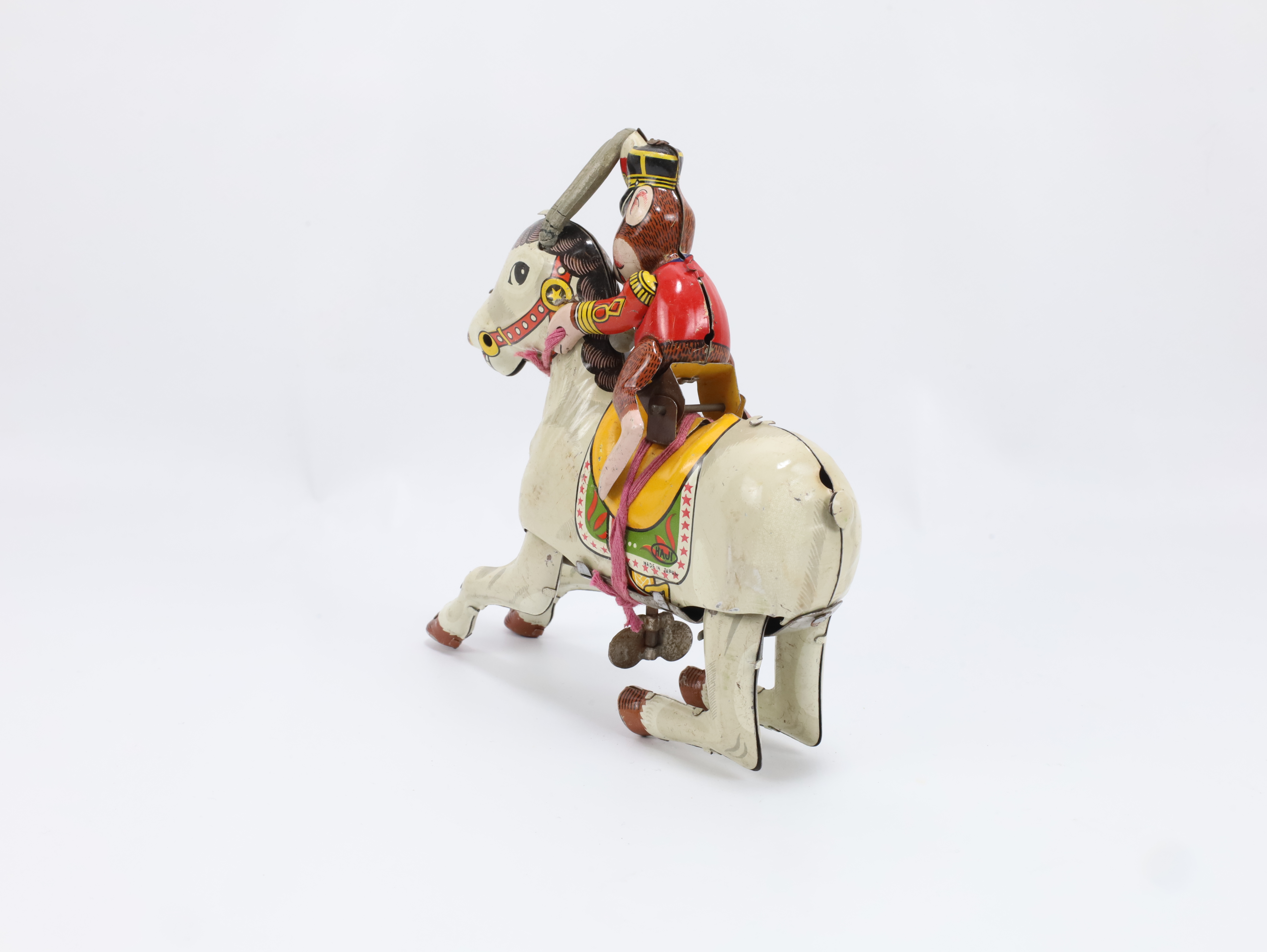 Vintage blikkleke – HAJI Japan opptrekkbar hest med rytter – 50/60-tall